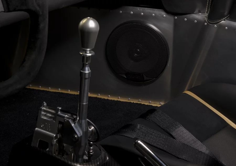 Ultima Evolution billet quick-shifter and gold piping detail
