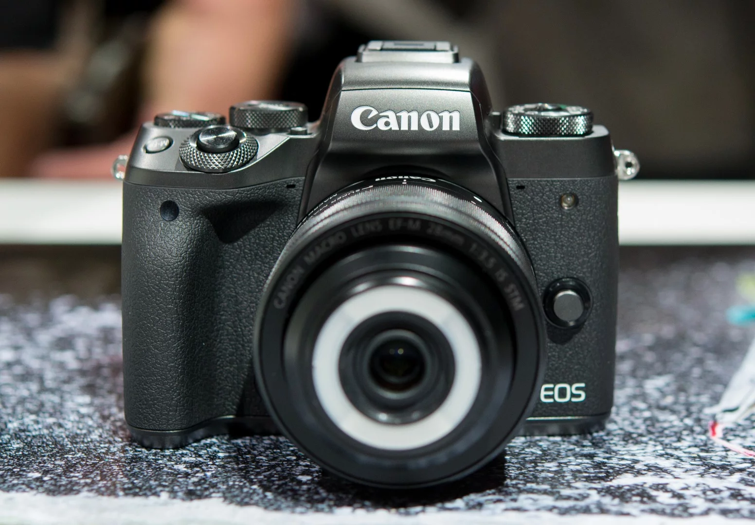 The Canon's EF-M 28mm f/3.5 Macro IS STM lens features a built-in ring light
