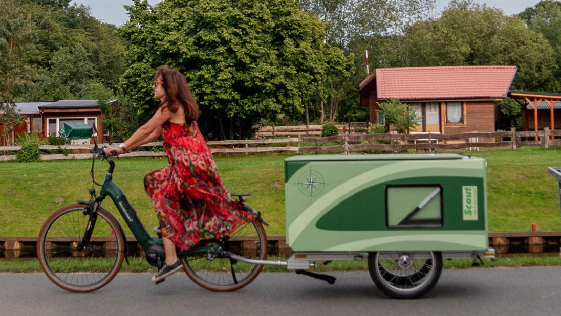 With a few flips and folds, the Scout camper packs down into a lower, more towable box form