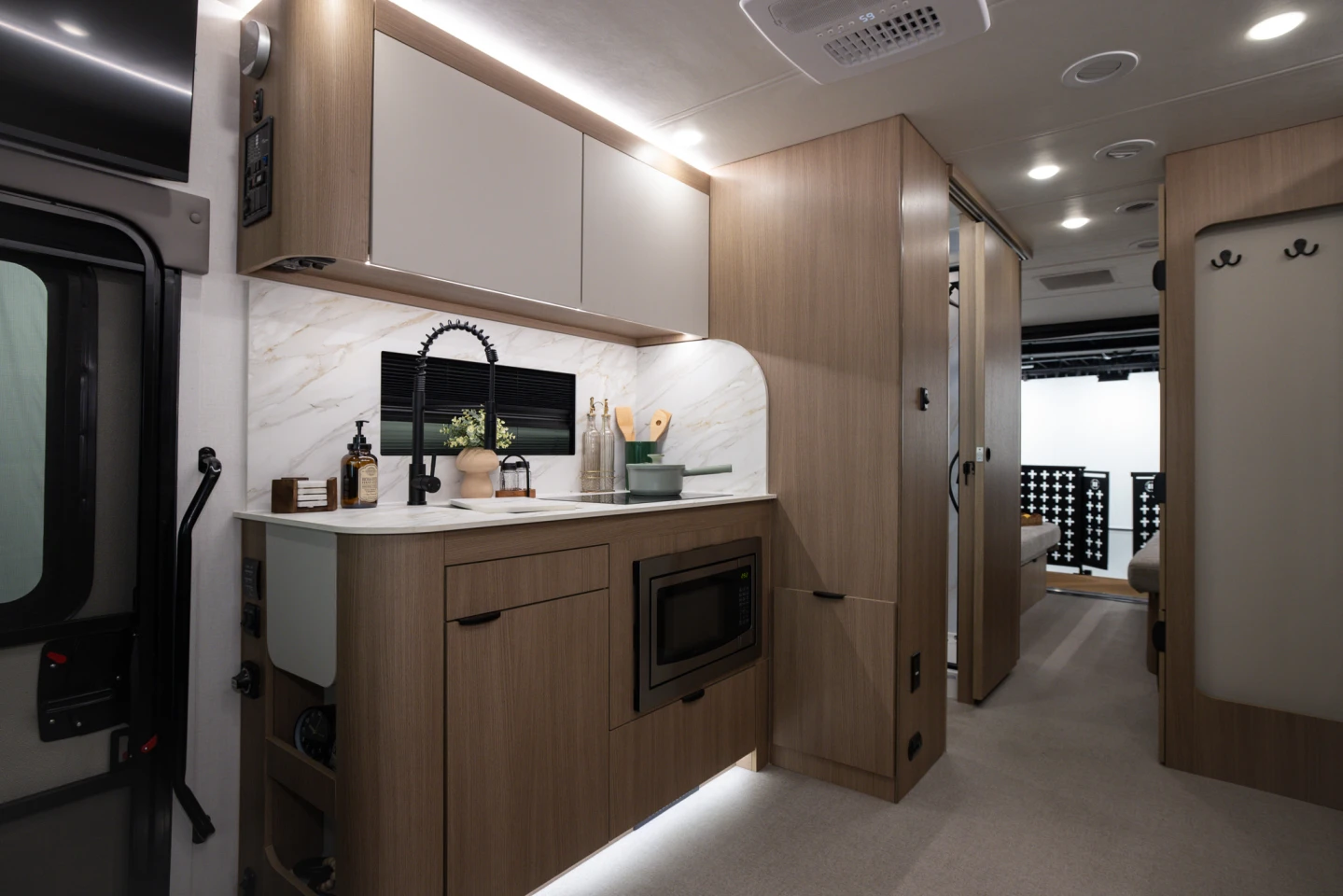 Coachmen notes that it finishes the Origin's furnishings in laminate instead of paper for more durable performance
