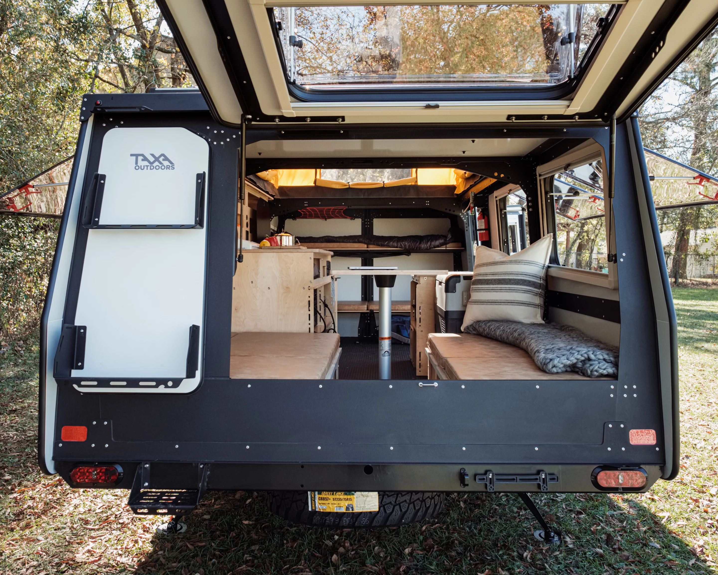 Redesigned for 2020, the rear-end now includes a hatch door and sturdy steps up to the roof