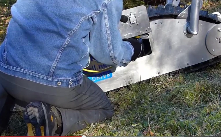A hidden port in the MTT-136 provides portable electricity to areas where larger generators might have trouble accessing