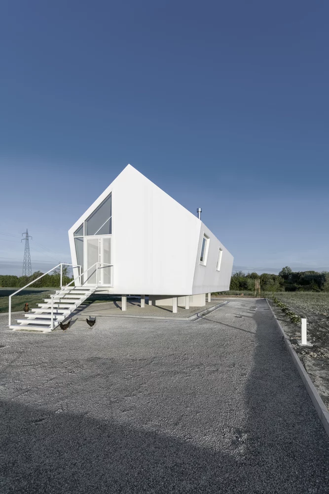 Casa Nell'Orto is a simple, modern and sustainable home that connects its owners directly with their much loved vegetable garden