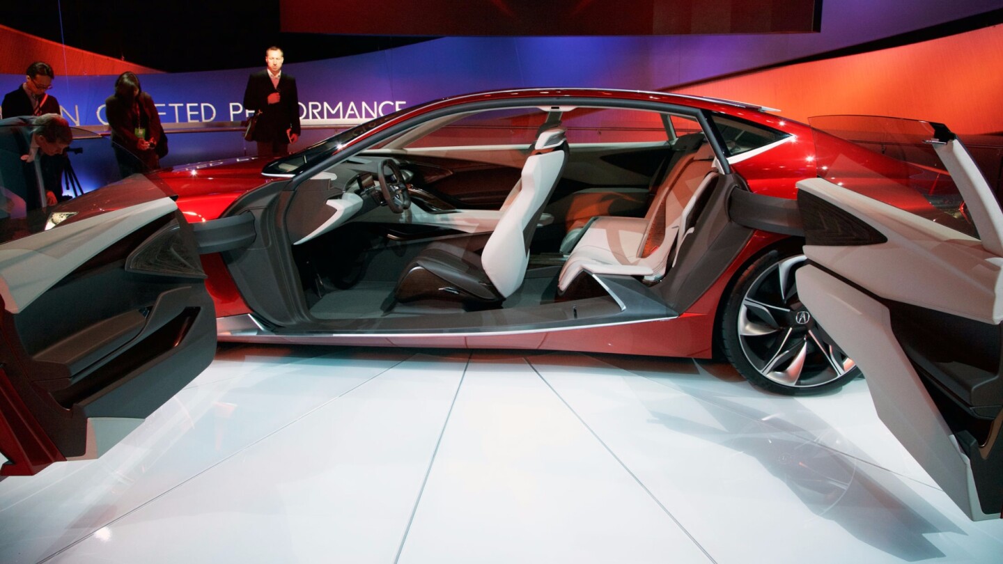 Even the shape of the seating itself continues the diamond themes of the Acura Precision Concept's exterior