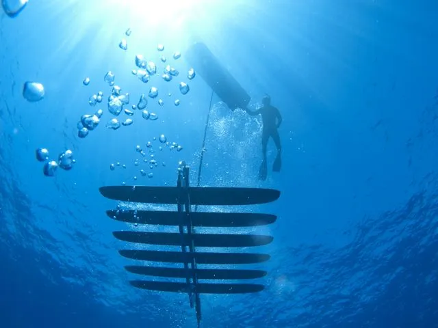 Each Wave Glider consists of a floating "boat" tethered to an underwater winged platform