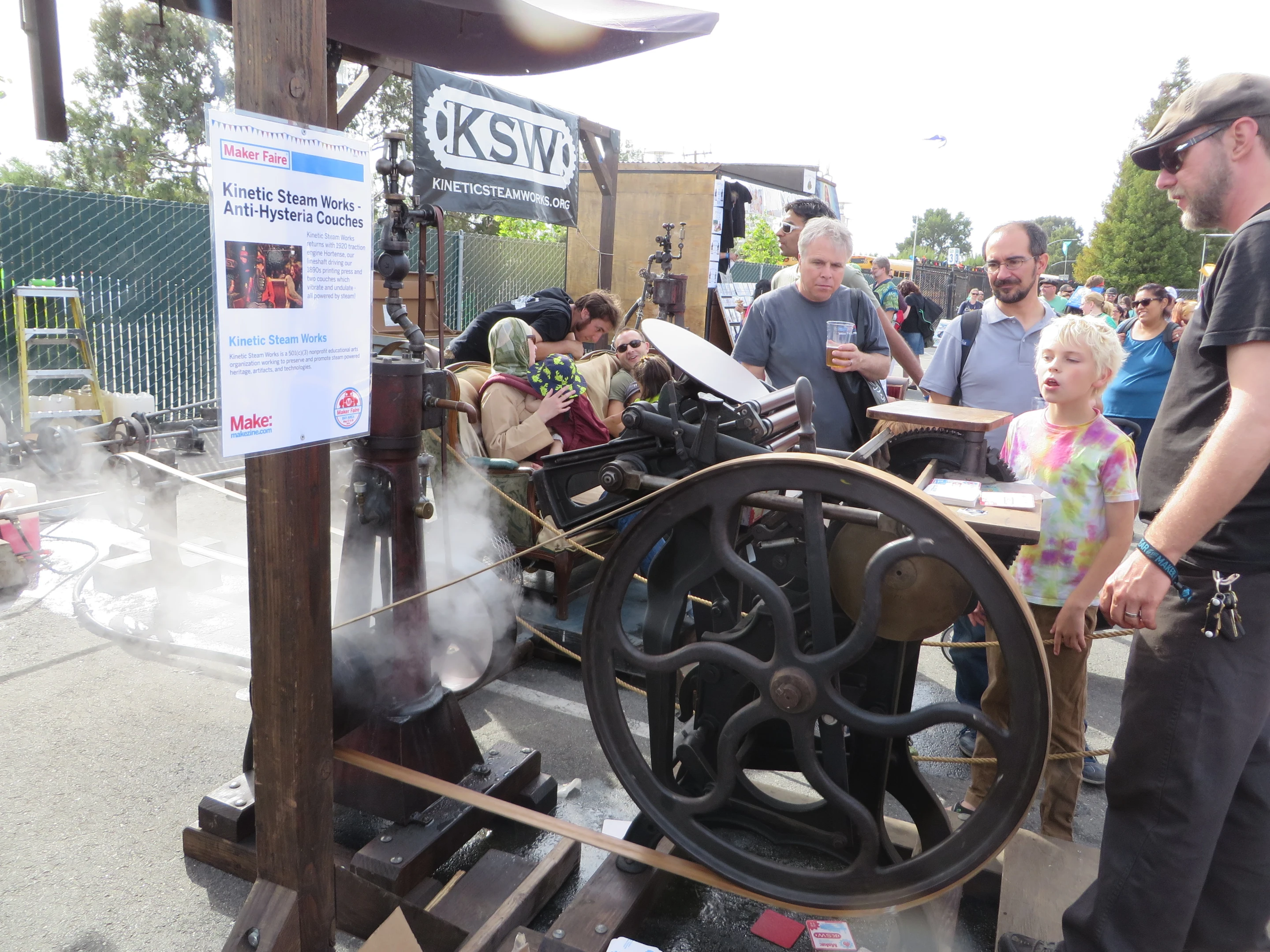 A steam-powered printing press creates collectible coasters
