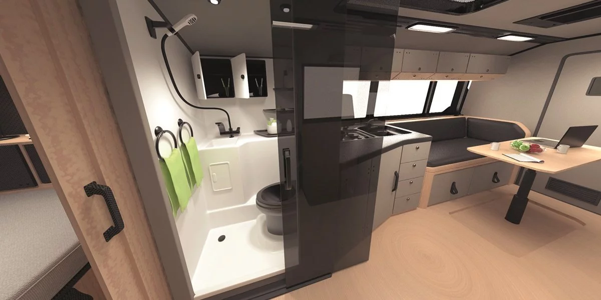 A stylish bathroom with tinted glass door, toilet and sink/shower head