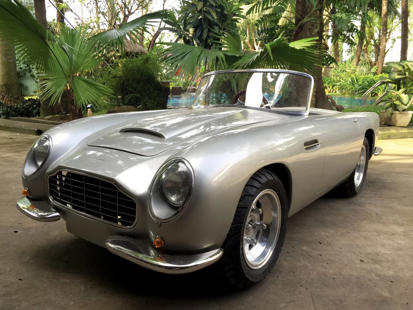 This silver Aston Martin DB5 replica has a non-rotating 007 number plate, a 110 cc, single-cylinder engine, a fiberglass body, and is reportedly capable of speeds of up to 40 mph. It features sophisticated steering, a fully independent suspension, front and rear disc brakes, and a three-speed, semi-automatic transmission with reverse. It sold for $30,500 at RM-Sotheby's Scottsdale 2018 auction.