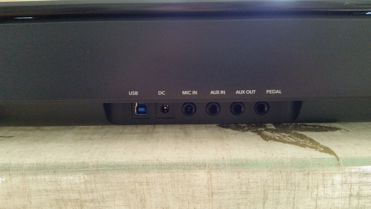 The back of the One Smart Light piano with multiple plug-ins