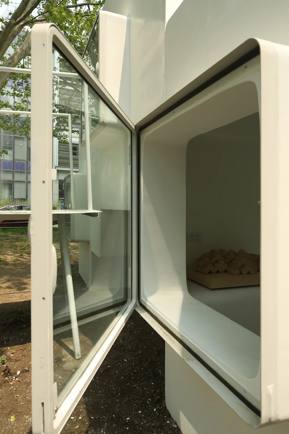 Micro-house features large windows for fresh air and natural light