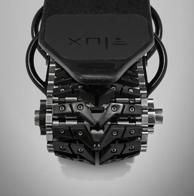 Flux explains that it put a lot of work into designing its own track optimized for traction, durability and weight savings