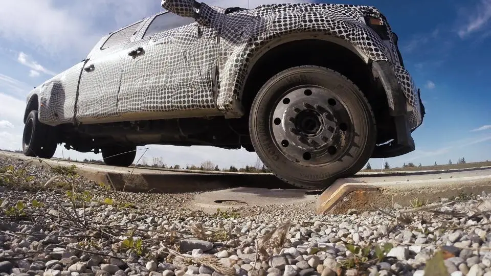 This prototype 2017 Ford F-Series Super Duty is undergoing stress testing under the guidance of the self-driving robots