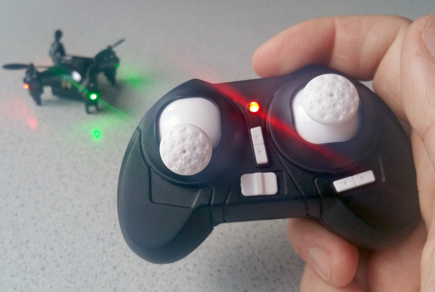 Although the Axis Drones Vidius comes with a transmitter, users can fly the quadcopter by using a smartphone with the Axis Drones mobile app