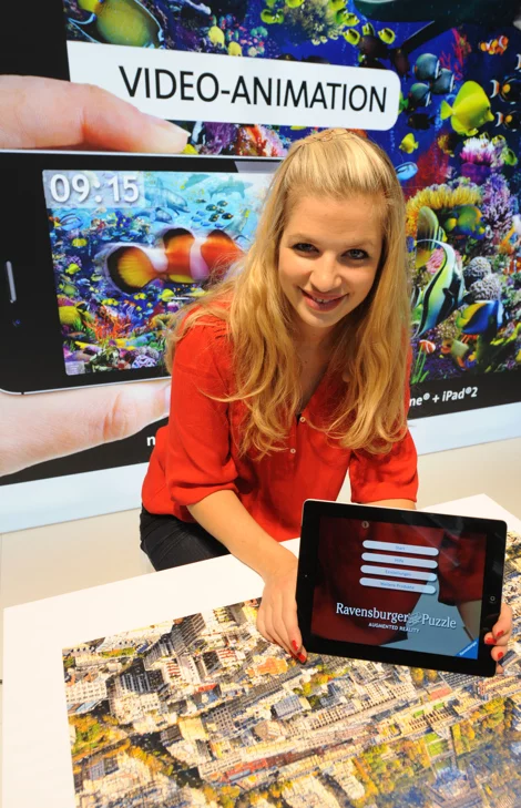 Actress Susan Sideropoulos showing off the new Augmented Reality Puzzle at a press preview in Nuremberg, Germany recently