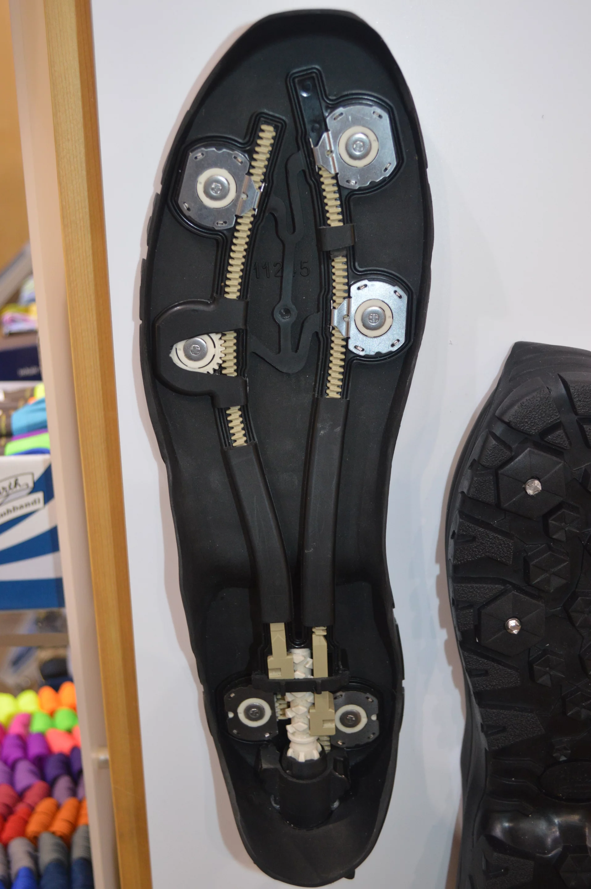 The geared system in the sole allows for easy spike deployment and retraction