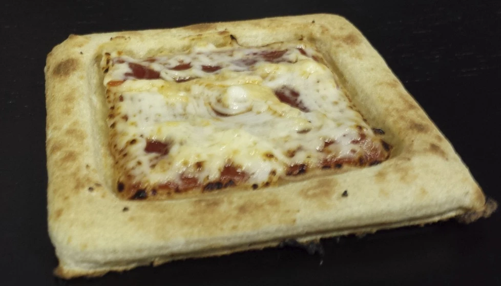 A 3D-printed pizza that astronauts might one day be able to dig into (Photo: Anjan Contractor)