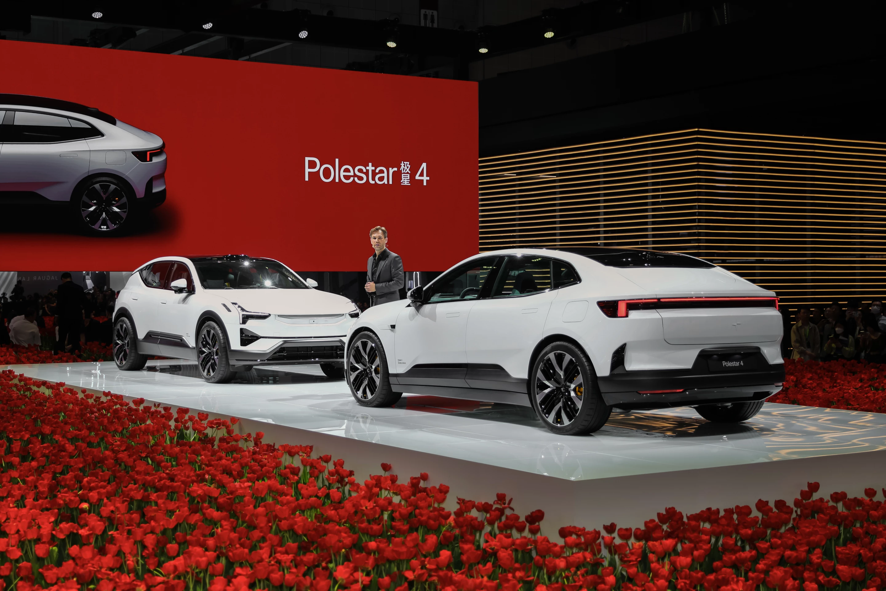 The Polestar 4 debuts atop a bed of roses at Auto Shanghai 2023 (the model to the rear left is the Polestar 3)