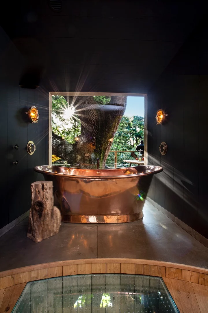 The Woodsman's Treehouse has a copper bathtub