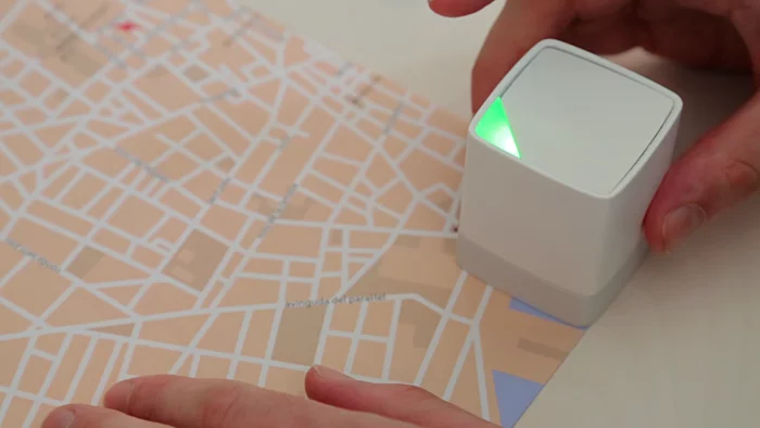 Once the Cube's flashing red indicator light turns to green, you know that the task is complete