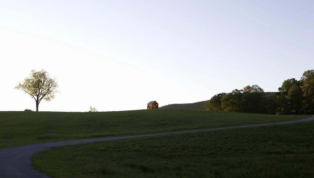 Solarium sits alone atop an isolated hill (Photo: William Lamson, Solarium, 2012, (Steel, glass, sugar, plants, 10' 10" x 8' 11" x 10' 3 3⁄8 in.) Courtesy the artist and Pierogi Gallery, © Storm King Art Center)