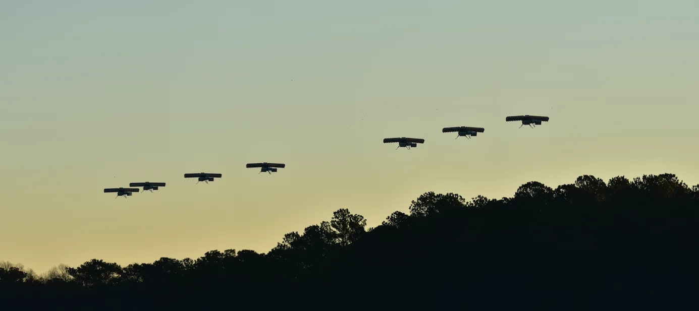 A composite image of DARPA's VTOL subscale test aircraft in horizontal flight