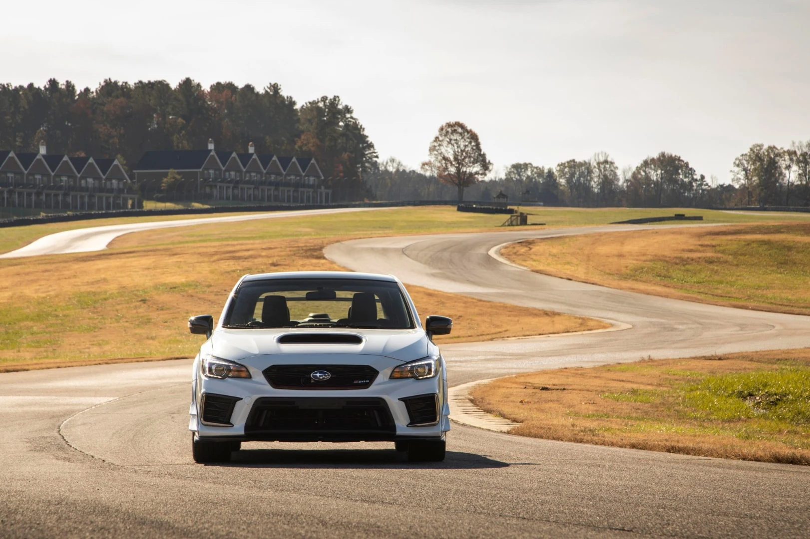 The wider fenders also serve to allow more venting to the engine for cooling and more air turbulence control via vents at the rear of the car