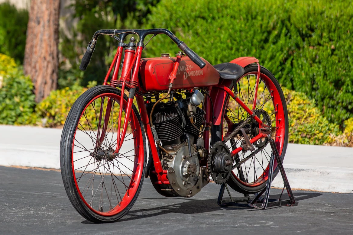 This 102-year-old board track racer was used by Dewey Sims (one of the legends of the board track era) and will sell with a 90-year-old photo of Sims on this bike, significant correspondence from Sims, a winning trophy from the 1931 Peoria 5-Mile State Champion Race, a section of board track mounted for display purposes, and his racing helmet and goggles from the period. The lot is essentially a museum exhibit.