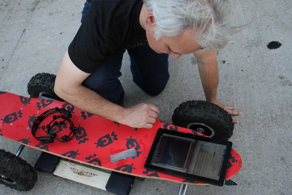 A prototype Windows 8 tablet on top of the board monitors the controls and can adjust speed settings