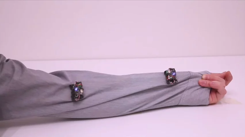 A couple of Rovables make their way along a sleeve