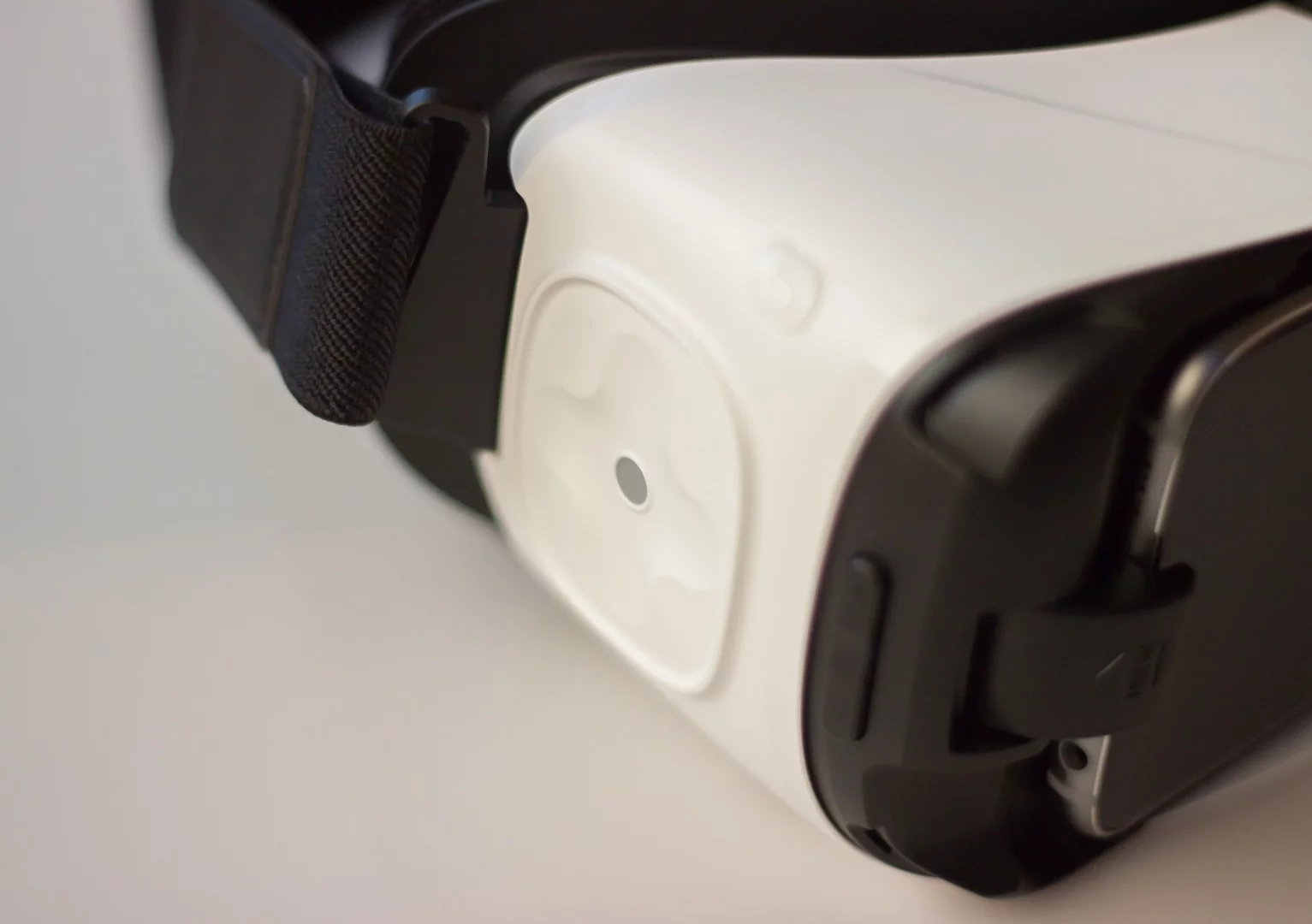 The touchpad now has a cross-shaped indentation on it that makes it easier to find when your eyes are focused in a virtual world