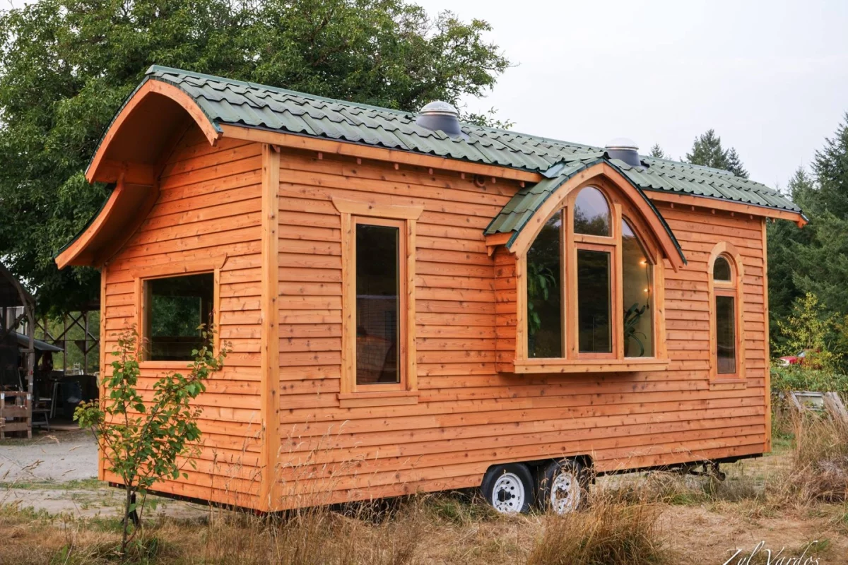 An Onduvilla-tiled roof and its 13 handmade window frames help give the Damselfly House a unique identity