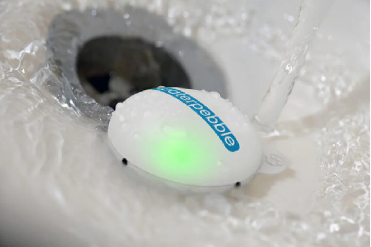 Water Pebble helps you to stop wasting water by taking too long in the shower (Photo: Priestmangoode)