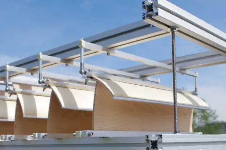 A new sunshade system from ETH Zurich uses changes in humidity to bend planks of wood, creating more or less shade as required