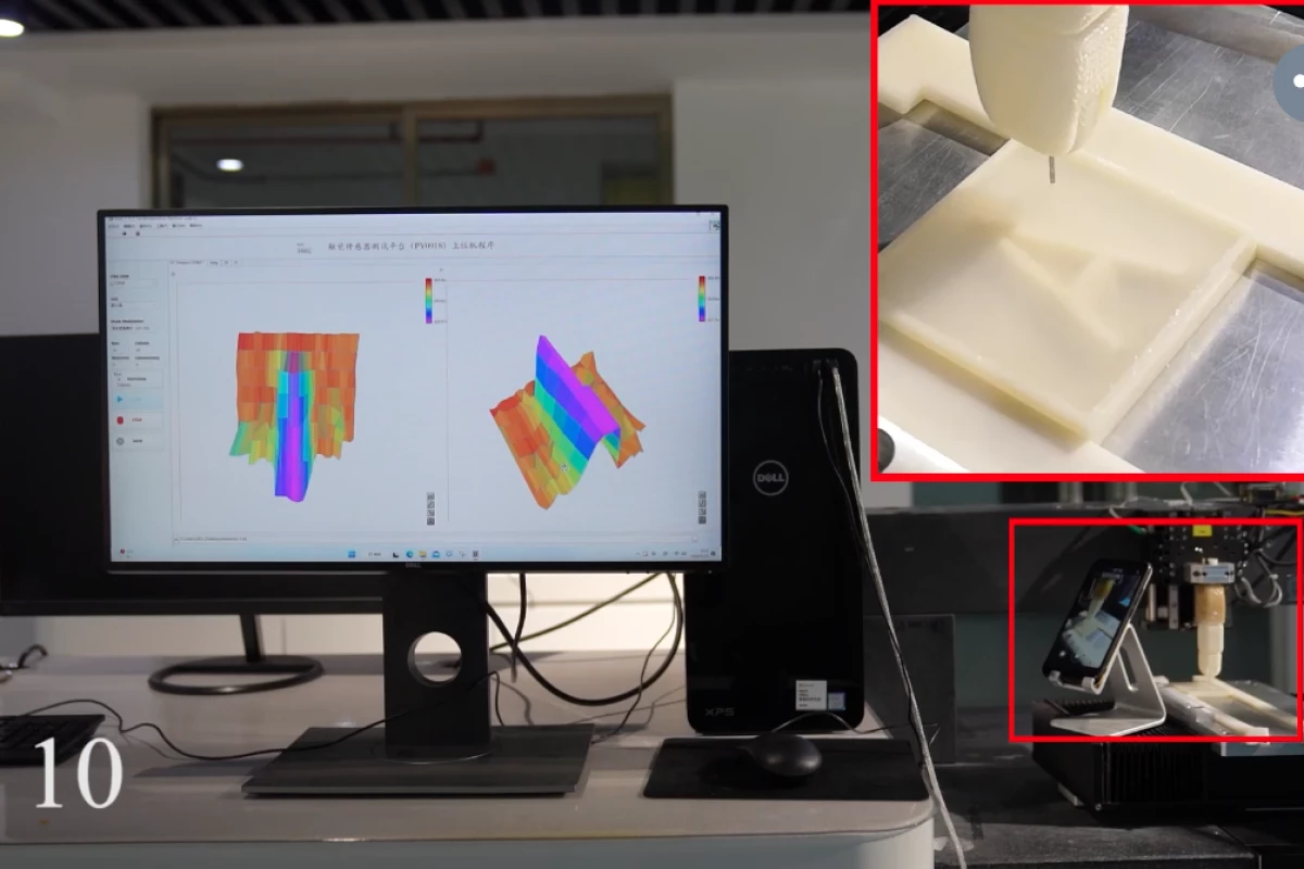 Image showing inset of bionic finger with computer screens showing 3d models
