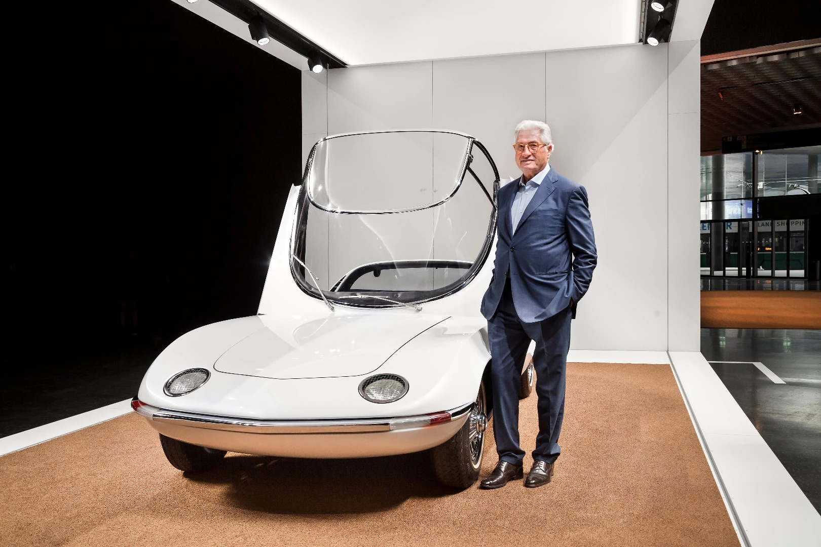 Giorgetto Giugaro with the 1962 Bertone Corvair Testudo, which he designed at 24 years of age.