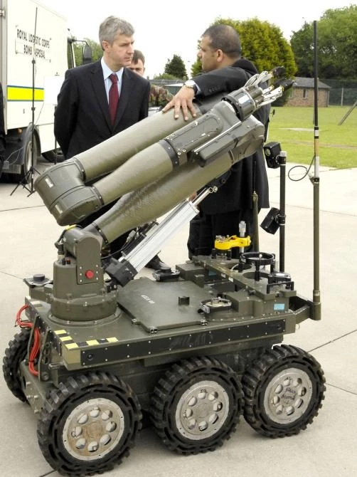 Under-Secretary of State for Defence, Derek Twigg MP, paid a visit to East Anglia to highlight the defense industry's support for the community. At Wattisham Airfield, he met Northrop Grumman's Nasser Bhatti who displayed the prototype CUTLASS robotic veh