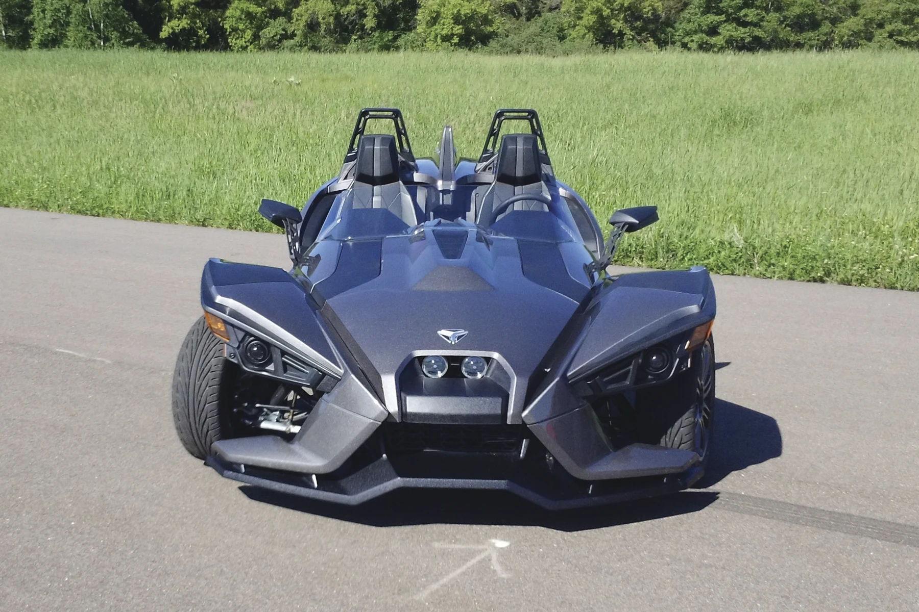 The Slingshot is a three-wheeled, two-seater with a broad stance