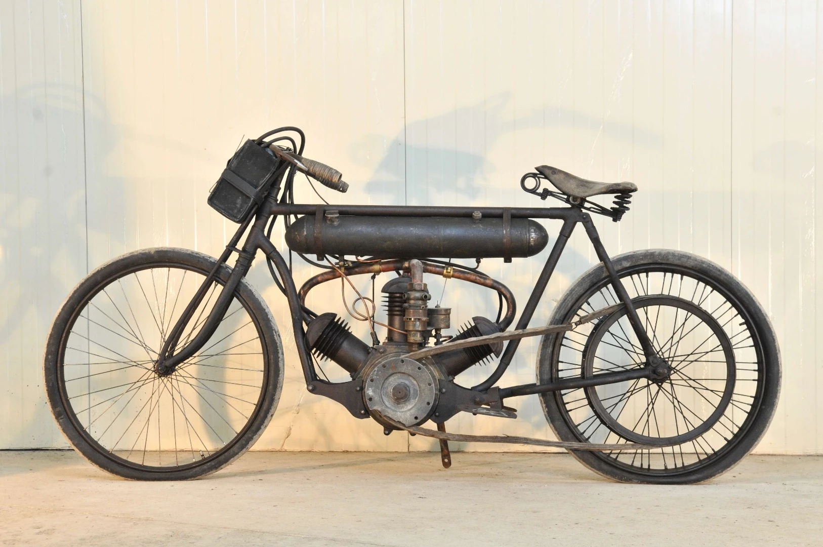 Alessandro Anzani is Italy's answer to Glen Curtiss, with both men riding motorcycles of their own manufacture in competition before going on to build massive companies around their engineering expertise. Anzani even made spare parts for Curtiss engines for many years. The engine in this motorcycle is not much different to the Anzani engine used by Louis Blériot to make the first flight across the English Channel in 1909. While Anzani was initially known for his 3-cylinder fan engines like the one above, he went on to make 2-, 3-, 4-, 5-, 6-, 7-, 10-, 14- and 20-cylinder engines in his factories in England, France and Italy, providing them to motorcycle manufacturers such as McEvoy, Montgomery, Cotton, and Greeves, while cars that used Anzani's engines included Morgan, AC, and Frazer-Nash. While the Anzani fetched nearly three times its estimate at $102,242 ( € 83,440 ), another motorcycle on offer at Artcurial's official Retromobile auction with a three-cylinder fan layout caused a lot of interest, because the crankcase is clearly stamped as a Buchet, yet it is near identical to the Anzani and predates it by a year. The Buchet sold for €56,024 ($68,648), more than double its estimate.