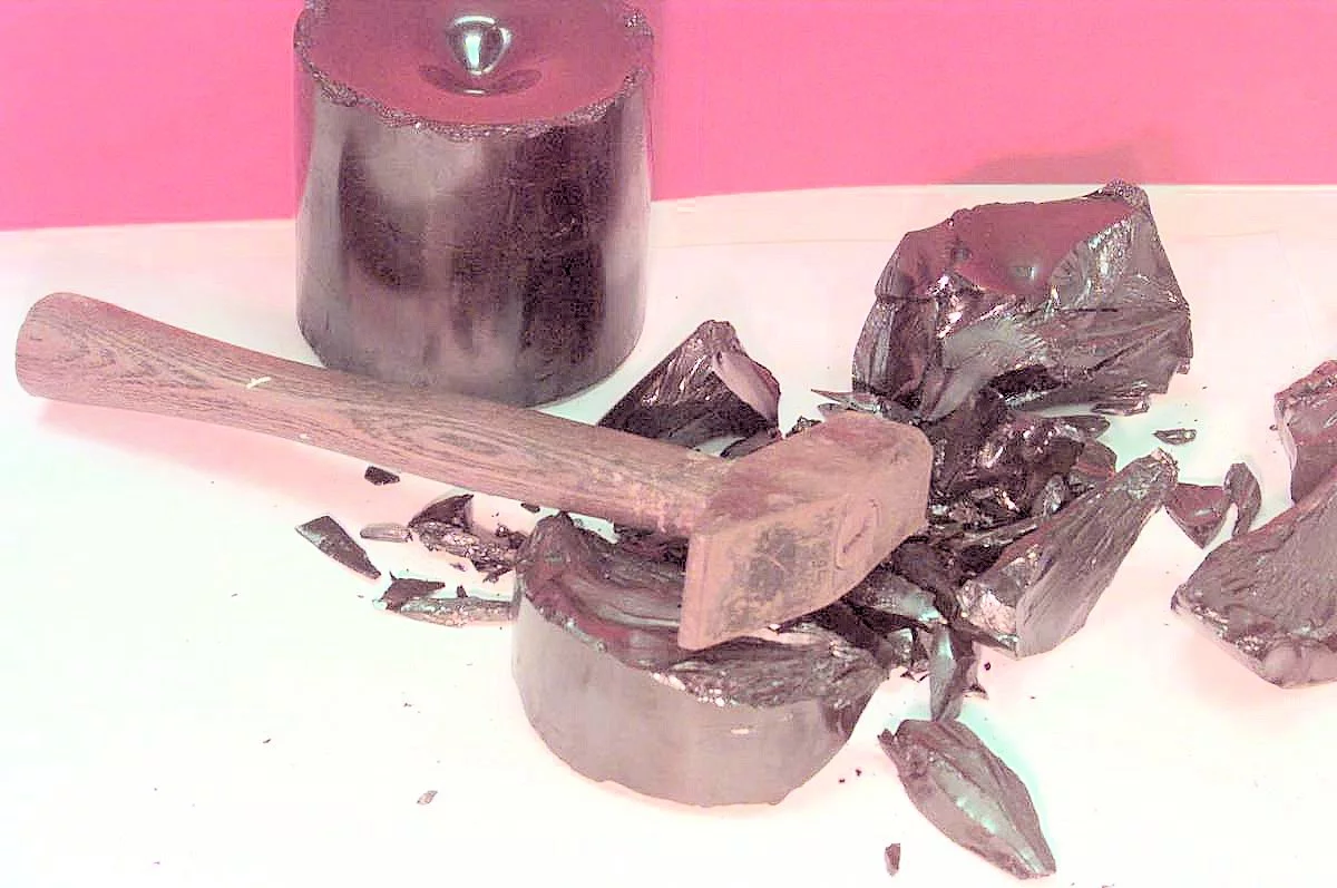 Pitch behaves like a liquid when stressed slowly, but shatters like a brittle solid when struck with a hammer (Photo: University of Queensland)