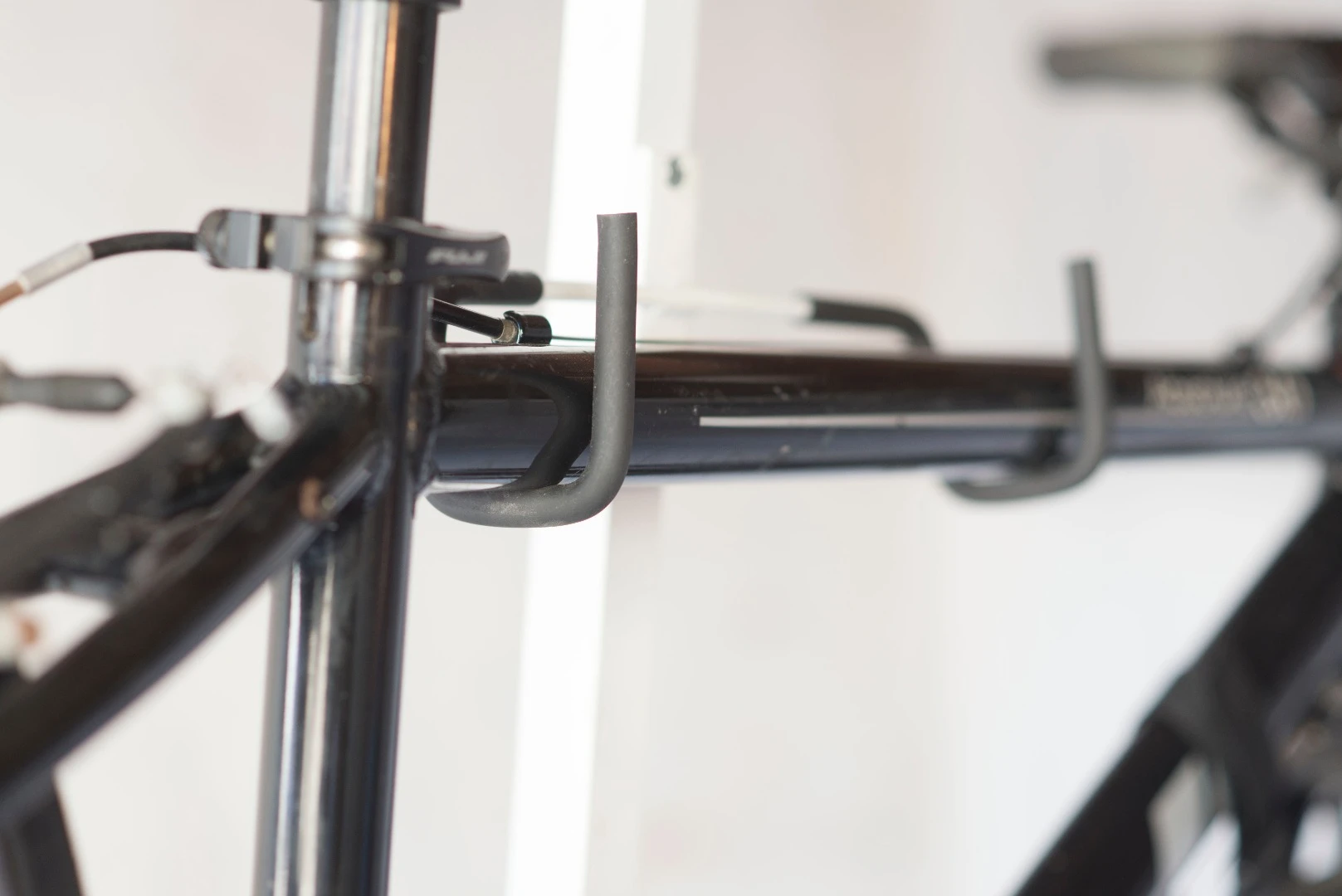 Bikes weighing up to 50 lb (23 kg) can be loaded onto the rack by way of a pair of Norprene-coated hooks, while there's also a seperate locking loop for added security