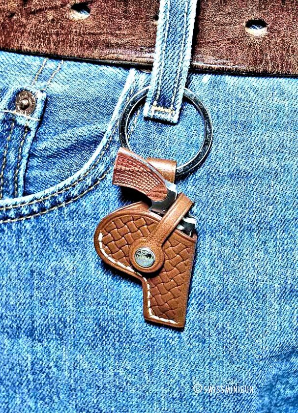 The C1ST SwissMiniGun revolver comes with a fitted holster for unconcealed carry - here seen dangling from a belt loop (Photo: SwissMiniGun)