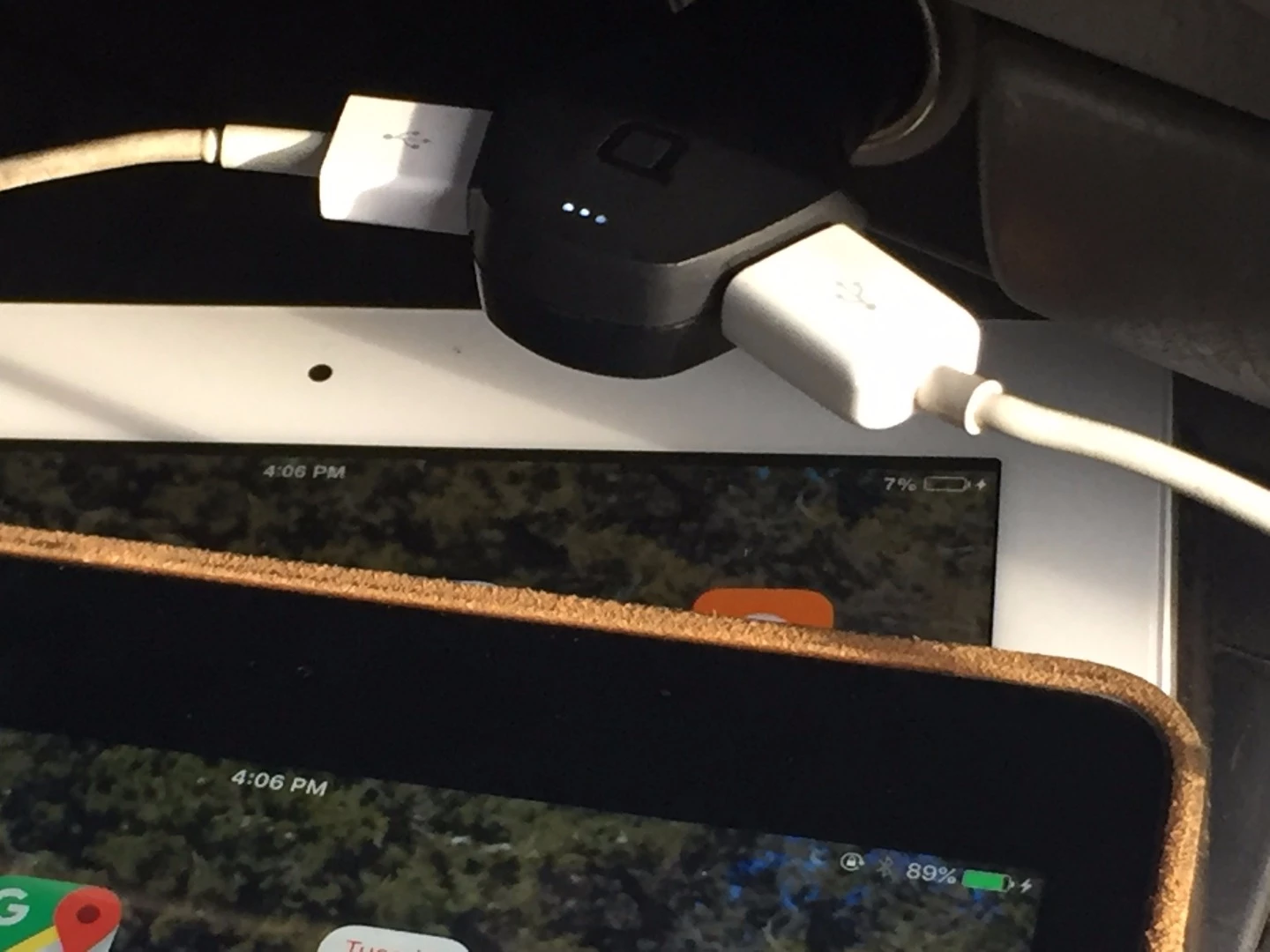 Zus smart car charger charging two iPads
