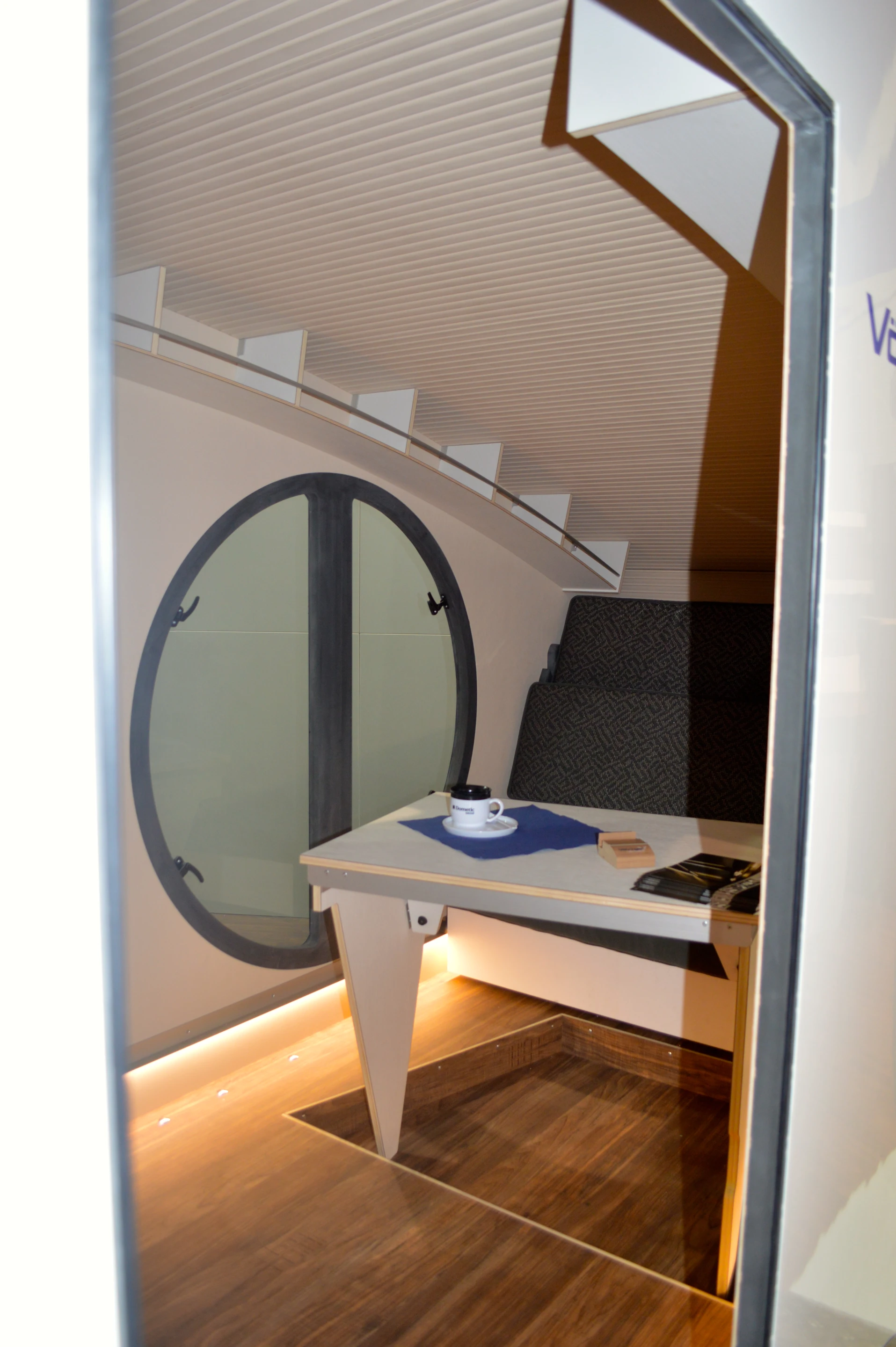 The Lucky Wagon's spartan interior includes a table and seating