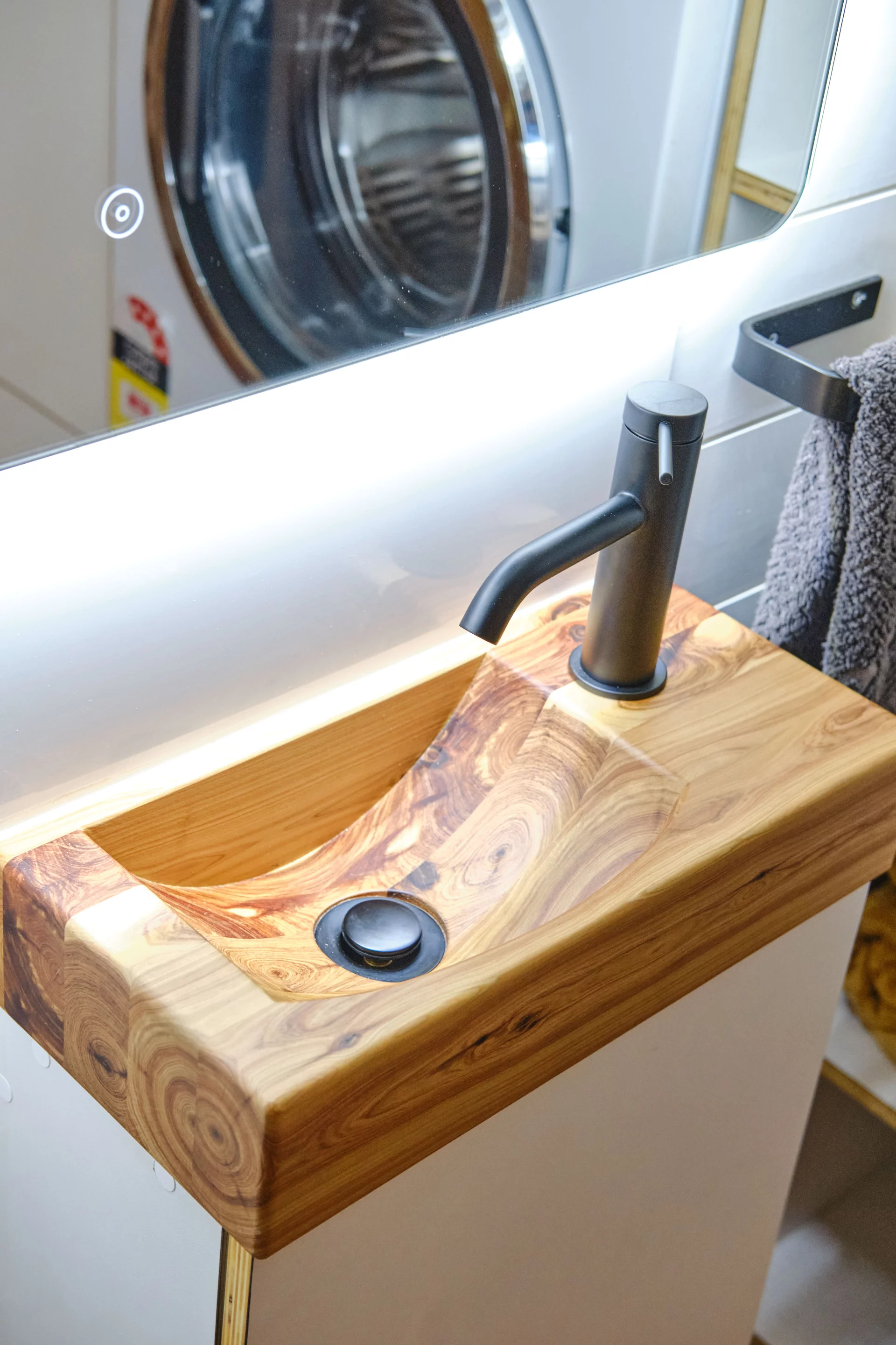 The Grand Sojourner Layout 3's bathroom features a very small vanity sink