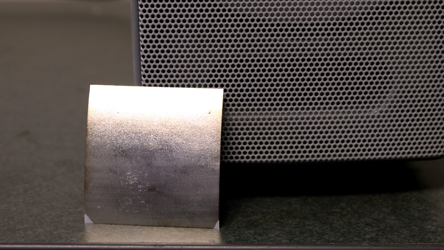 The FENG material can convert mechanical energy into electrical energy, and vice versa, making it function both as a speaker and a microphone