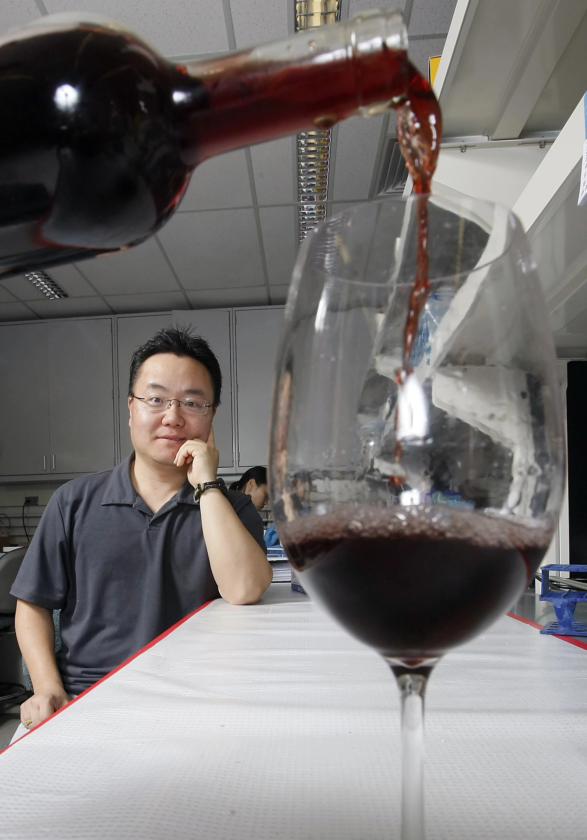 Assistant professor Kee-Hong Kim from Purdue University is testing a compound that is commonly found in red wine for its ability to block the processes of fat cell development