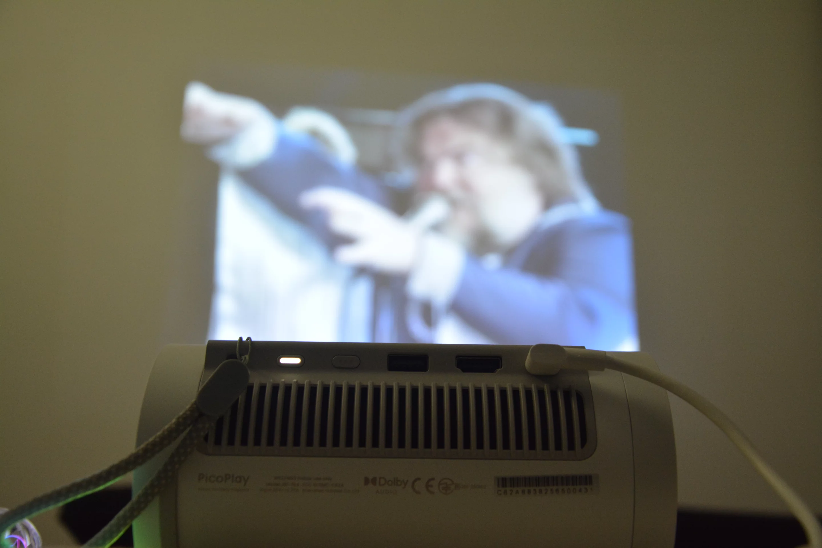 Focus on the JMGO PicoPlay, but the projector throws surprisingly bright 1080p visuals (though can't compete with full-on ambient light)