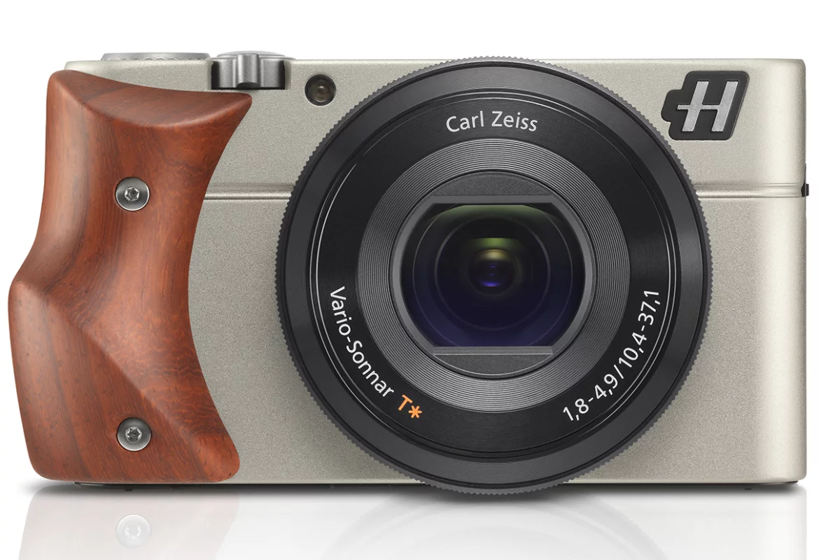 The Hasselblad Stellar is a luxury compact camera modelled on the Sony RX100, pictured with a Padouk Wood hand-grip