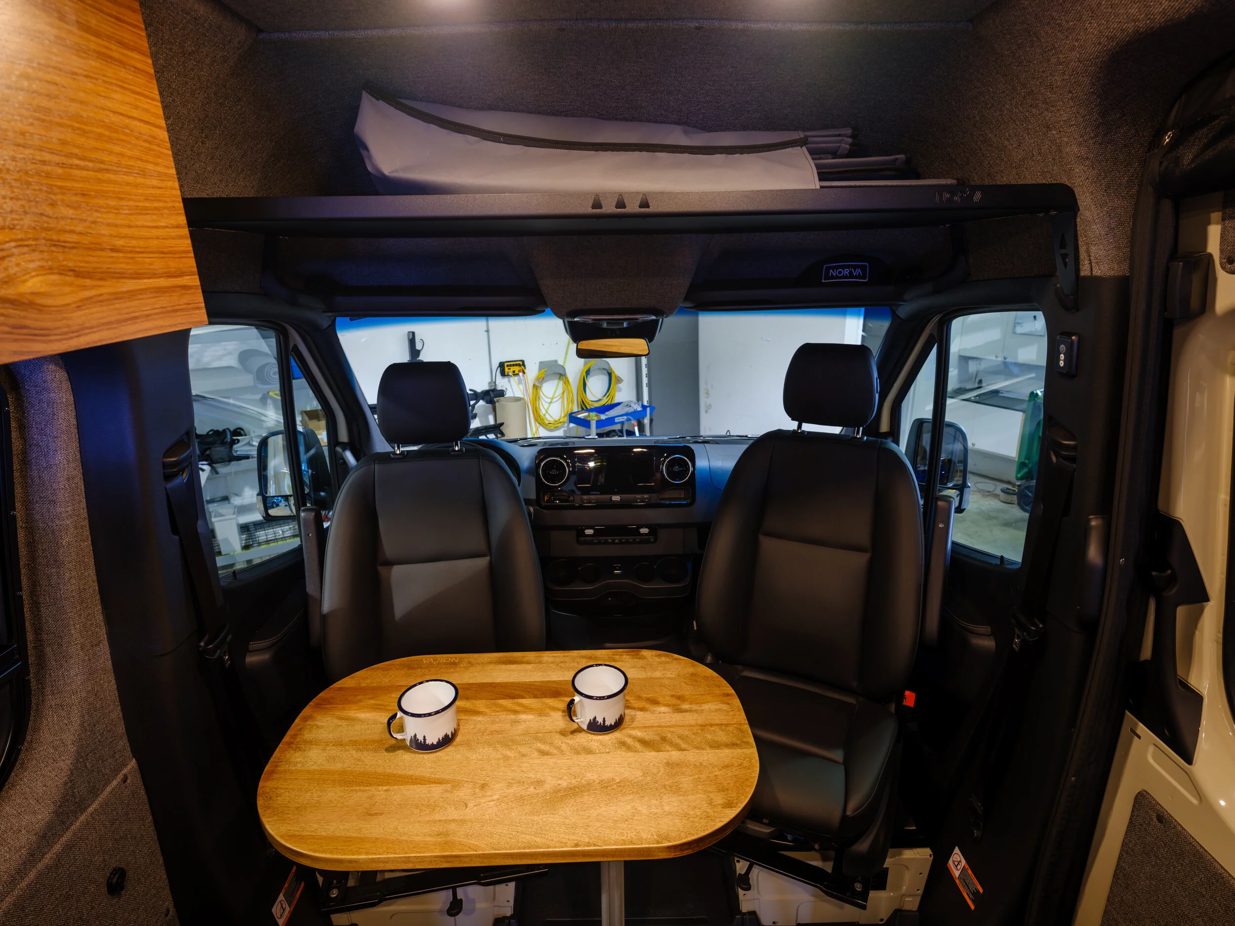 The front lounge seats five around a second Lagun table