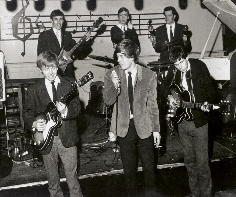 Brian Jones playing this 1960 Harmony Stratotone on stage with the Rolling Stones' first line up at the Marquee Club, Oxford Street, London in 1963. They certainly look like a bunch of clean cut lads these days but their long hair at the time was quite outrageous